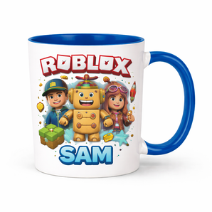 White 11 oz ceramic mug with blue rim and handle, featuring Roblox characters and "ROBLOX SAM" text.