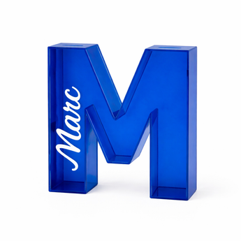 Personalized blue transparent acrylic letter "M" piggy bank with "Marc" printed in white.