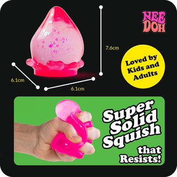 NEE DOH Dream Drop squishy fidget toy, blue, with glitter and a wavy base, showing 7.6cm height.