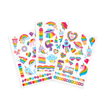 Three sheets of OOLY Tattoo Palooza temporary tattoos featuring colorful rainbows, unicorns, and other playful designs.