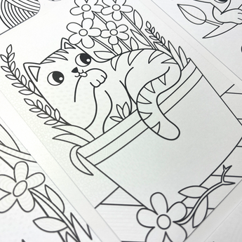 Ooly Undercover Art colouring page showing a cute cat in a pot with flowers, revealing hidden patterns.