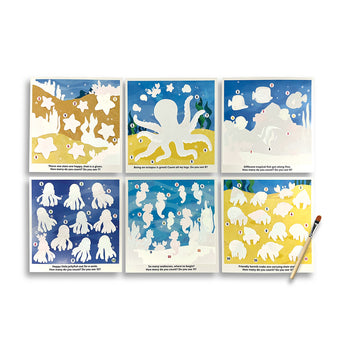 Six white Ooly Water Amaze Boards with faint Under the Sea illustrations and a paintbrush.