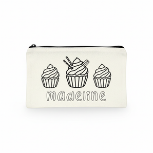 Pouch with cupcake designs and 'madeline' text on a white background