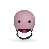 Pink Scoot & Ride kids helmet with a matte finish, black straps, and a bright red rear LED light.