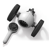 White Sharper Image RC Jumping Car toy with large black wheels and a matching one-handed remote control.