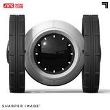 Sharper Image RC Jumping Car with large black tires and a sleek silver body, featuring a dark central lens.
