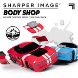 Red and blue Sharper Image RC demolition cars with removable body panels, ready for crashing fun.