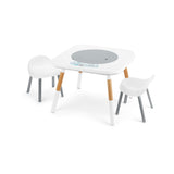 White and wood modern children's activity table with two white chairs, featuring a gray circular insert.