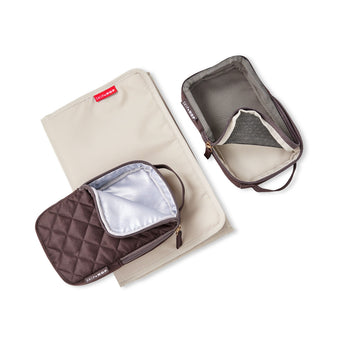 Skip Hop Forma quilted brown packing cubes and beige changing pad, laid flat.
