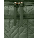 Close-up of a dark green quilted Skip Hop Forma backpack with gold zippers and leather pulls.
