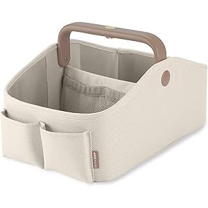 Skip Hop Light Up Diaper Caddy in cream with a brown glowing handle, modular divider, and four pockets.