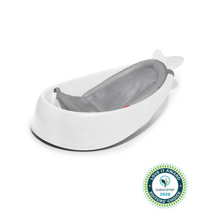 White Skip Hop Moby Smart Sling 3-Stage Tub with gray mesh sling, whale tail design.