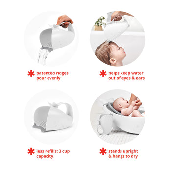 White whale-shaped Skip Hop Moby Waterfall Rinser with grey rubber lip, pouring water over a baby.