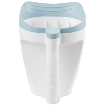 White Skip Hop Moby Waterfall Rinser with a light blue top and soft rubber lip, featuring an easy-grip handle.