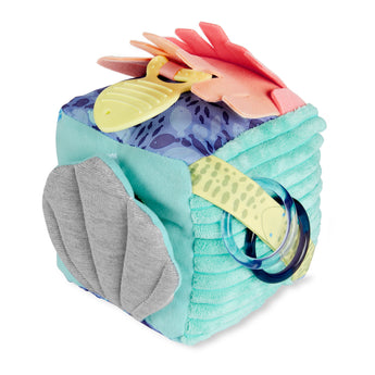Soft Skip Hop Seascape Activity Cube with blue, teal, and pink fabric, a fish teether, and crinkle shell.