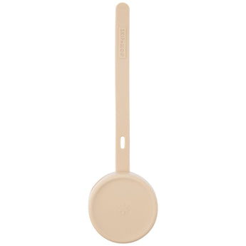 Skip Hop beige silicone pacifier holder with long strap, round base, and snowflake logo.