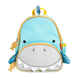 Skip Hop Zoo Shark Backpack: blue toddler mini backpack with a grey shark face, yellow zipper, and side pocket.