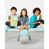 Three toddlers with Skip Hop Zoo shark backpack, lunch bag, and water bottle.