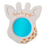 Sophie la girafe Magic Mirror SIGHT White teething toy, giraffe-shaped with a blue mirror and orange spots.