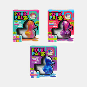 Three 'Pour Palz' art kits on a white background