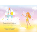 Open sticker book page showing Ruby the rainbow fairy, a colorful castle, and text.