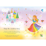 Open sticker book showing Ruby the Rainbow Fairy in a colorful dress, a magical castle, and birds.