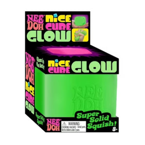NEE DOH Nice Cube Glow Squishy Fidget Toy in green, packaged in a black box with pink and yellow accents.