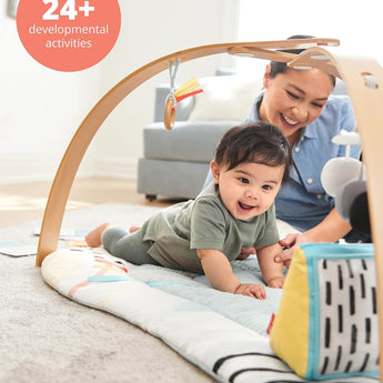 Baby enjoying the Skip Hop Painted Dreams 4-in-1 Play Gym