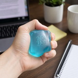 NeeDoh Nice Cube Blue lifestyle in hand