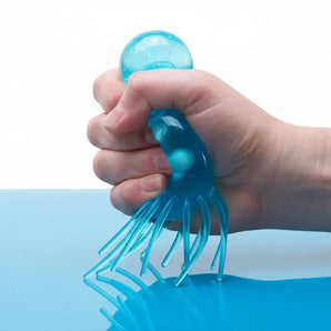 NeeDoh JellySquish Blue lifestyle in hand