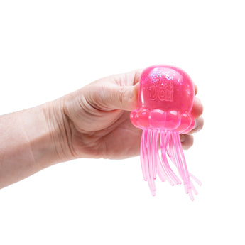 NeeDoh JellySquish Pink lifestyle in hand