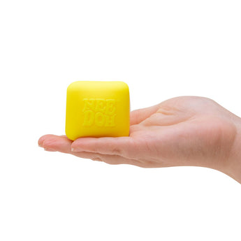 NeeDoh Color Changing Cube Yellow lifestyle in hand