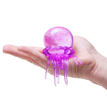 NeeDoh JellySquish Purple lifestyle in hand